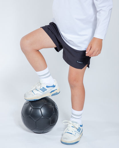 white and magenta kids shorts